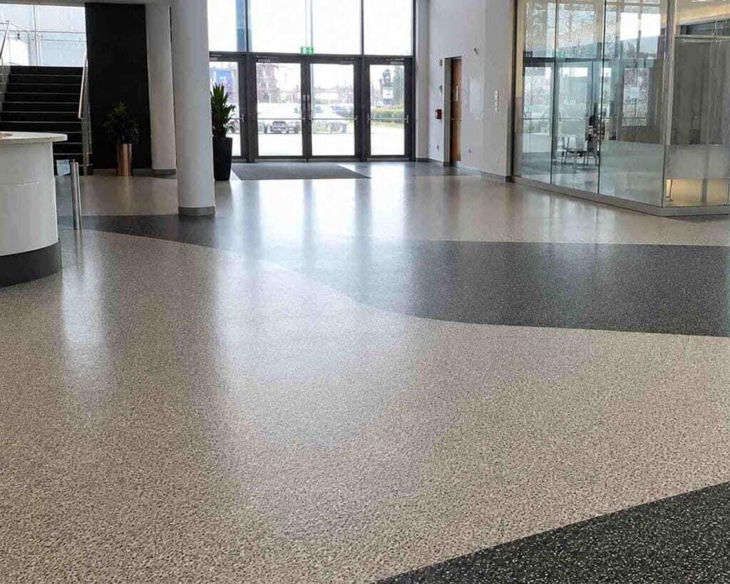 commercial epoxy colored sand floor application for modern building projects